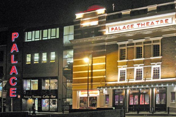 A night time external view of Watford Palace Theatre in Hertfordshire.