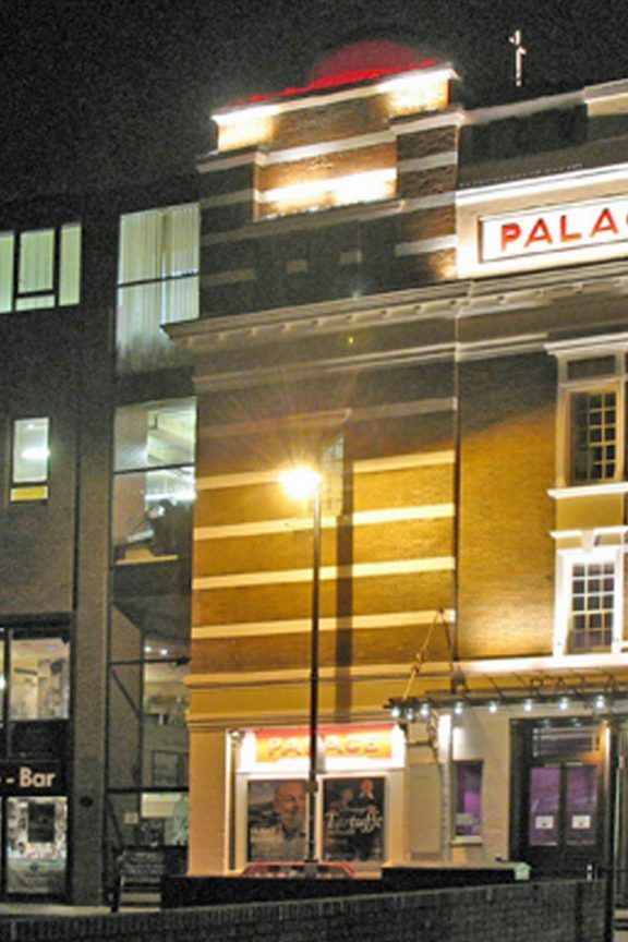 A night time external view of Watford Palace Theatre in Hertfordshire.